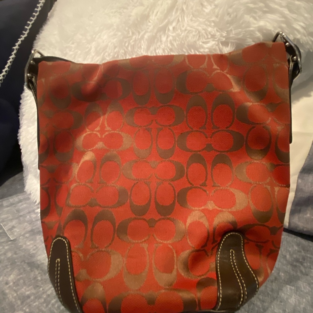 Red and brown COACH Handbag